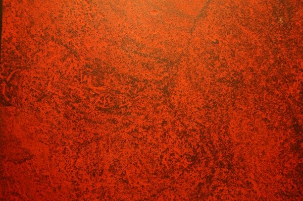 オルトレマテリア、黒の鏝模様の上に赤を組み合わせたサンプル