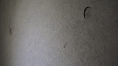 より本物に！コンクリート打ち放し風仕上げ