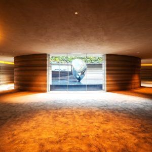 プラスタル塗り版築 - マンションの通路に施工