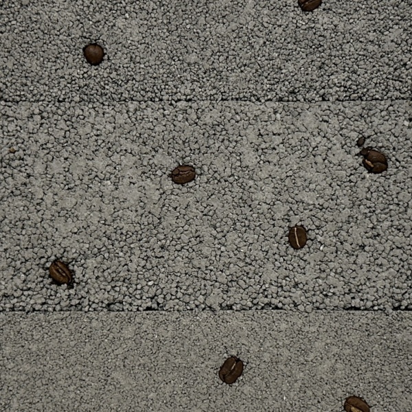 コーヒーかすを混ぜてコーヒー豆をまばらに入れたプラスタル塗り版築の壁サンプル。型番：SP9267