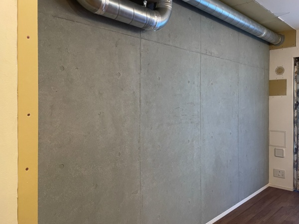 マンション室内の壁面に施工したコンクリート打ち放し風仕上げ